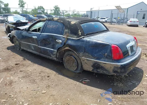 1999 Lincoln Town Car Cartier from USA, damaged, VIN 1LNHM83W0XY673738